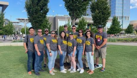 Group of people standing on grass