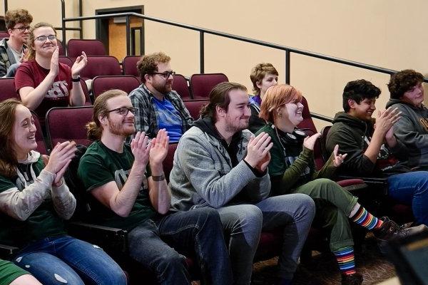 audience laughing at comedy show